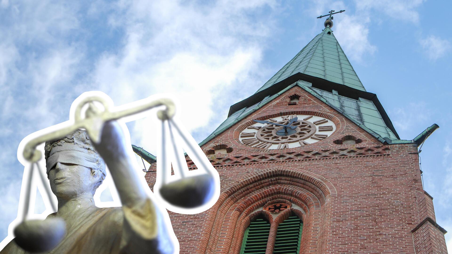 Kirchturm mit Justitia