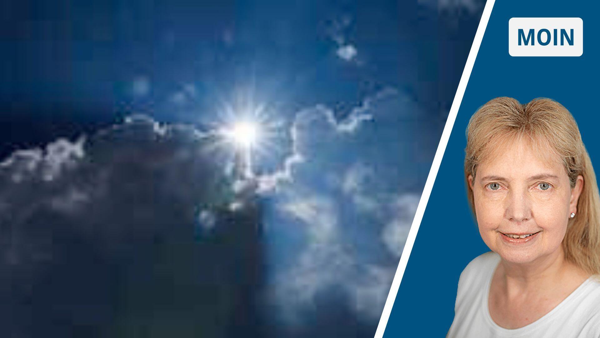 Sonne  strahlt  am blauen Himmel hinter Wolken