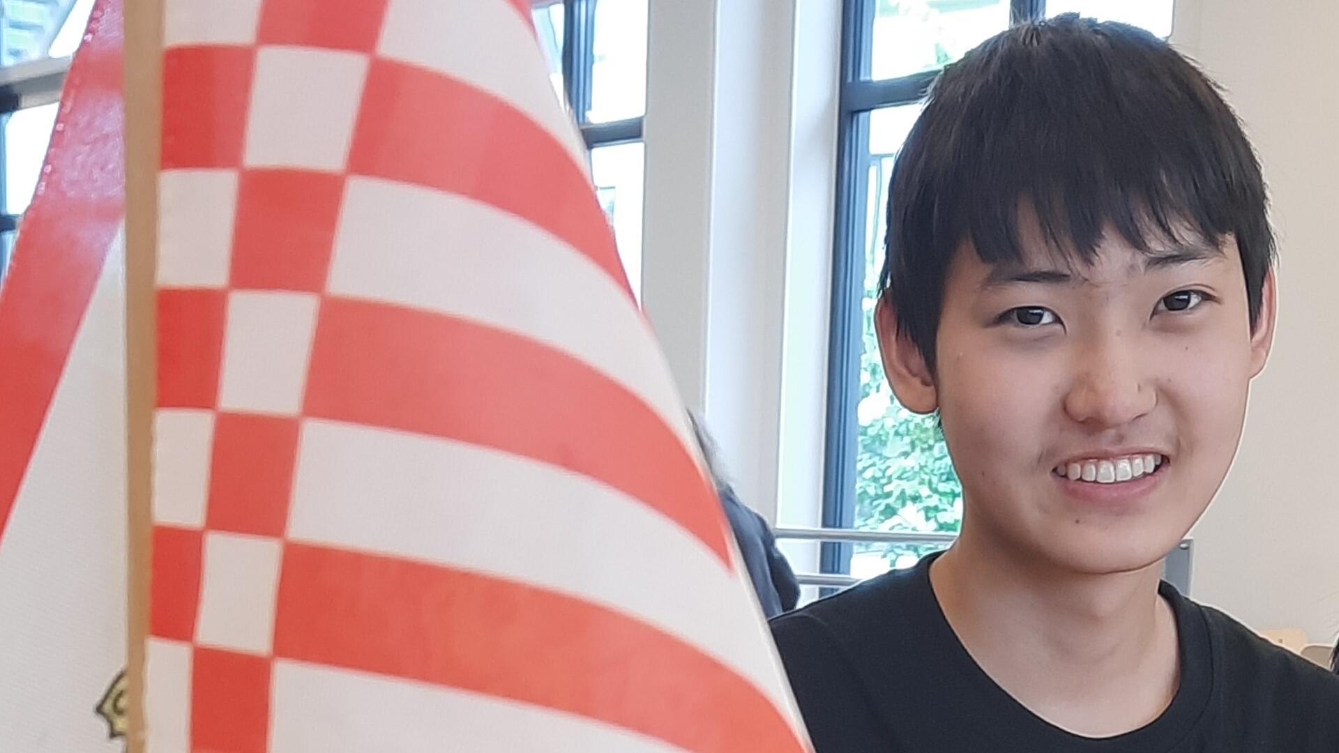 Ein Junge, Name Jizhe Ma.  