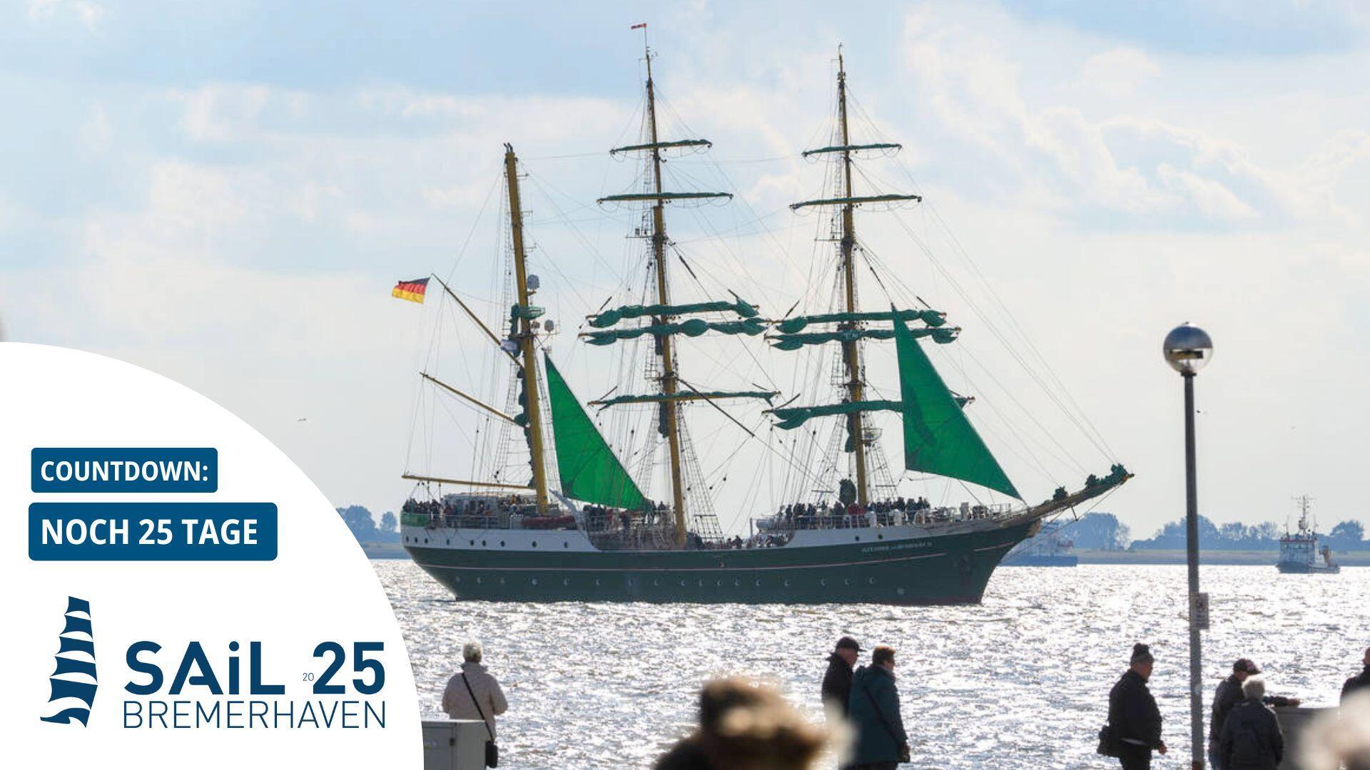 Das Schiff Alexander von Humboldt 2 bei einer Fahrt über die Weser. Menschen stehen am Deich und gucken zu.